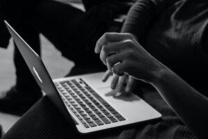 A picture of a person checking their reputation online.