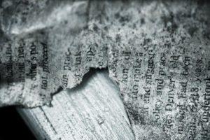 A picture of a shredded newspaper, showing how negative news can be removed.