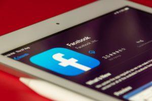 A picture of the Facebook application on a phone.