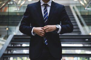 An image of a person in a suit who works for an online reputation management firm.