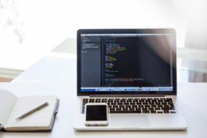 A image of a computer with some programming code on it of a changing website