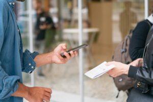 An image of someone scanning a QR code