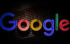 An image of the Google Logo with a dark background behind it.