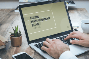 A picture of a crisis manager creating a crisis management plan.