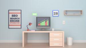 An image of a computer with a graph going up and a poster on the wall sayin SEO